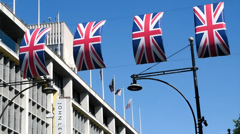 British flags against the backdrop of an intelligence agency building, illustrating the theme of the threat from Russia to UK infrastructure