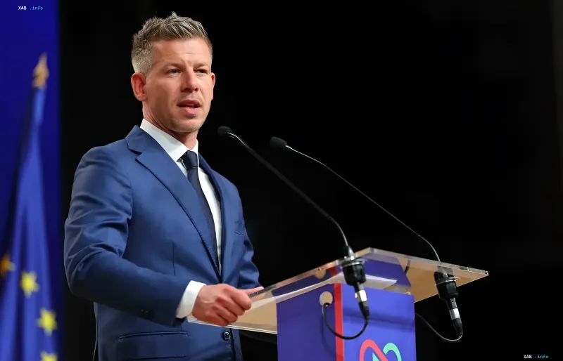 Hungary's new Prime Minister Peter Magyar delivers a speech against the backdrop of the EU flag, symbolizing the tension between Budapest and Brussels regarding Ukraine's EU integration.