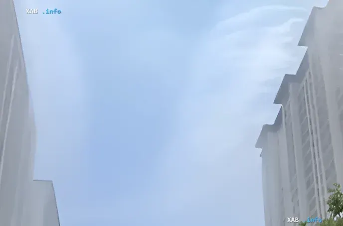 High-rise mist sprayers create dense fog between skyscrapers in Chinese city Yuncheng to cool the air