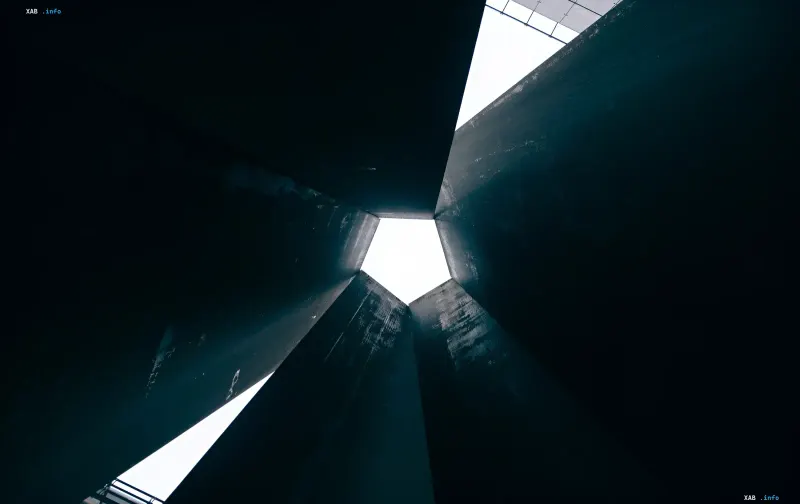 Abstract image of a dark geometric space with bright light, symbolizing technological breakthrough and bypassing sanctions