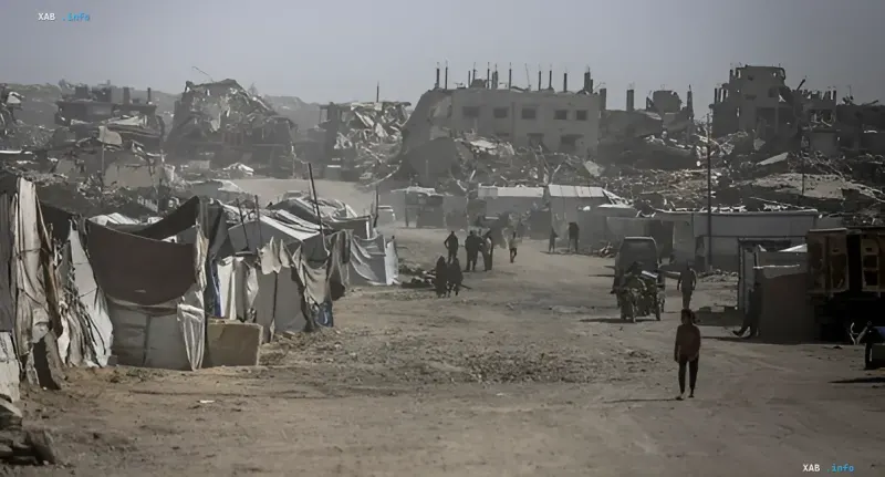 Destroyed buildings and a tent camp in Gaza, illustrating the challenges of deploying international forces