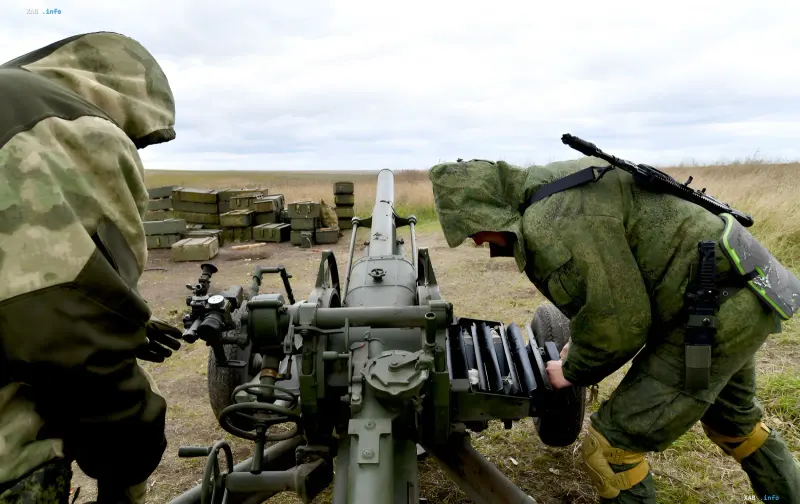 Ukrainian artillerymen firing a howitzer during a counter-raid operation near Konstantynivka
