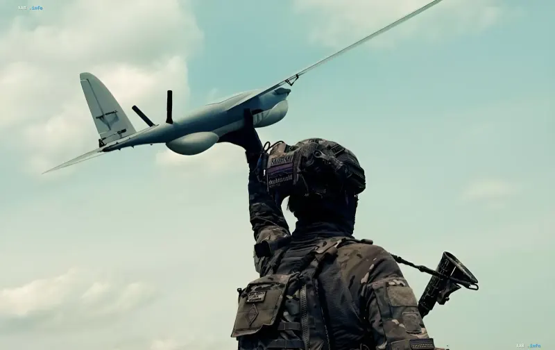 Soldier holding a drone, symbolizing the first combat interception of Iranian 'Shaheds' by the US Merops system