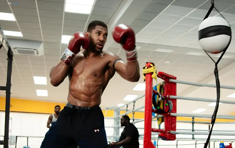 Anthony Joshua trains in a boxing gym ahead of his fight with Christian Premgy in Riyadh