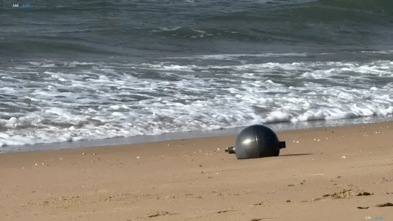 Satellite debris on a beach, illustrating the threat of falling space junk