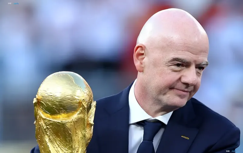 FIFA President Gianni Infantino with the World Cup trophy amid the scandal over World Cup rights and New Zealand's withdrawal of support