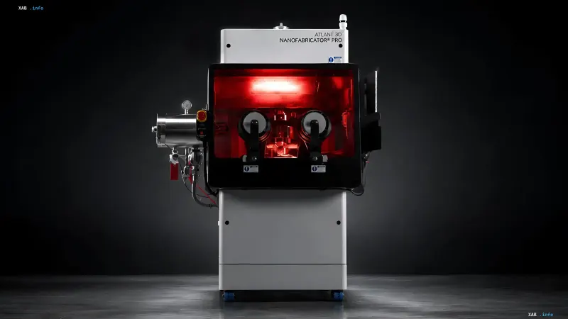 Atlant 3D Nanofabricator Pro 3D printer with red light inside, showcasing atomic material synthesis technology