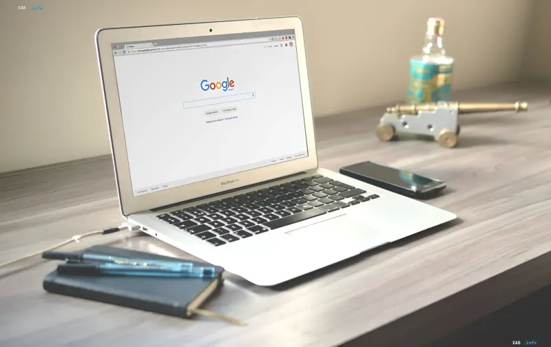 Laptop with Google Search and Gemini homepage open on a desk: a user exploring 3D models and interactive charts in the new learning mode