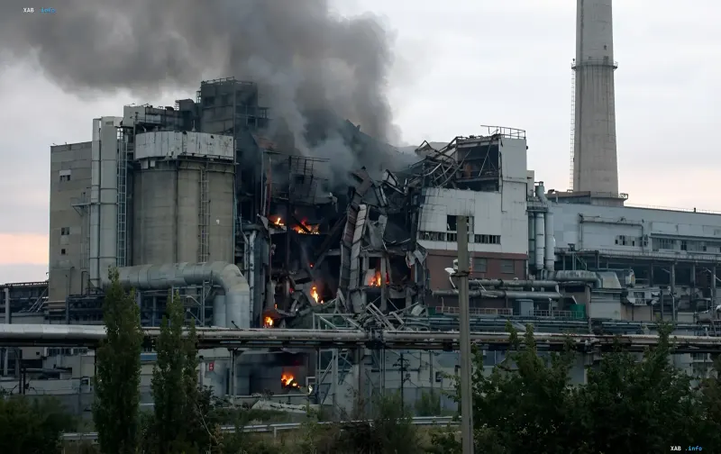 Destroyed Kherson CHP after a Russian glide bomb strike: smoke and fire from the damaged structure