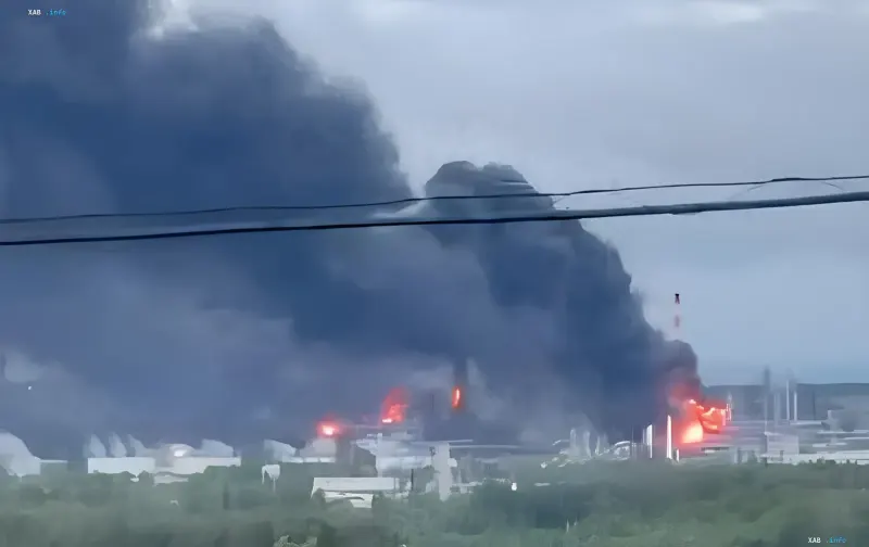 Fire at the Kostovo oil refinery after a Ukrainian FP-1 drone strike: thick black smoke and flames over industrial structures