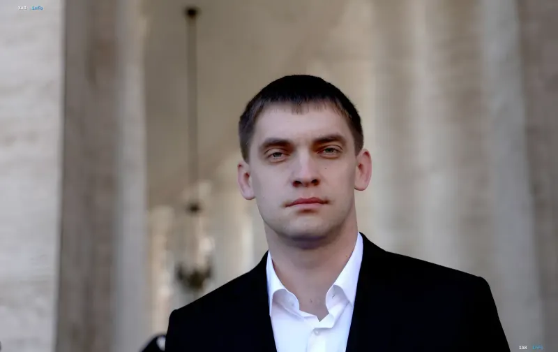 Ivan Fedorov, the new head of Ukraine's State Agency for Restoration, in a business suit against a government building backdrop