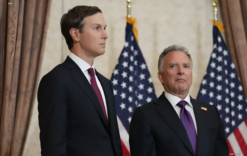 Witkoff and Kushner in front of US flags ahead of their Moscow and Kyiv trip to negotiate a pause in strikes