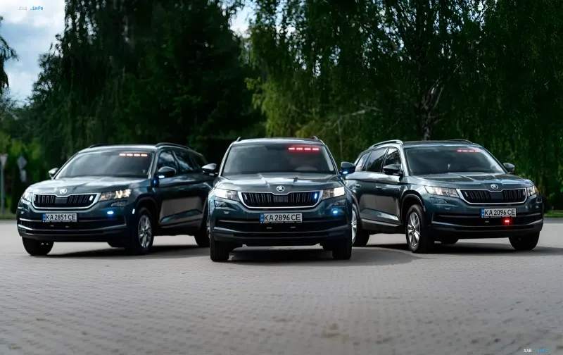 Three phantom patrol cars with activated emergency lights on a Kyiv road, recording speed violations