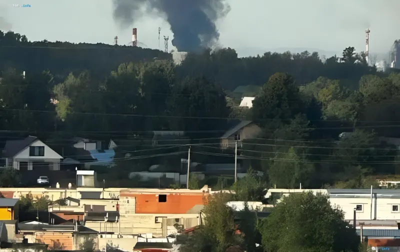 Smoke over the Ryazan Oil Refinery after a night drone attack: plume of smoke above refinery stacks and nearby houses