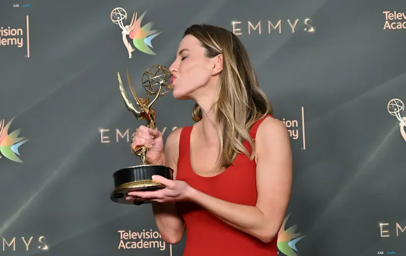 Emmy 2026 winner kisses her statuette in front of the Television Academy press wall