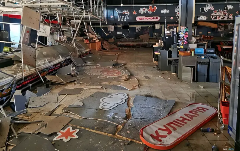 Destruction inside the City Mall shopping center in Zaporizhzhia after a Russian strike: collapsed ceiling, toppled shelves and fallen signage