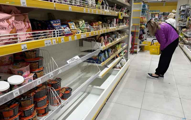Half-empty supermarket shelves in Kyiv amid food shortages following strikes on logistics and warehouses