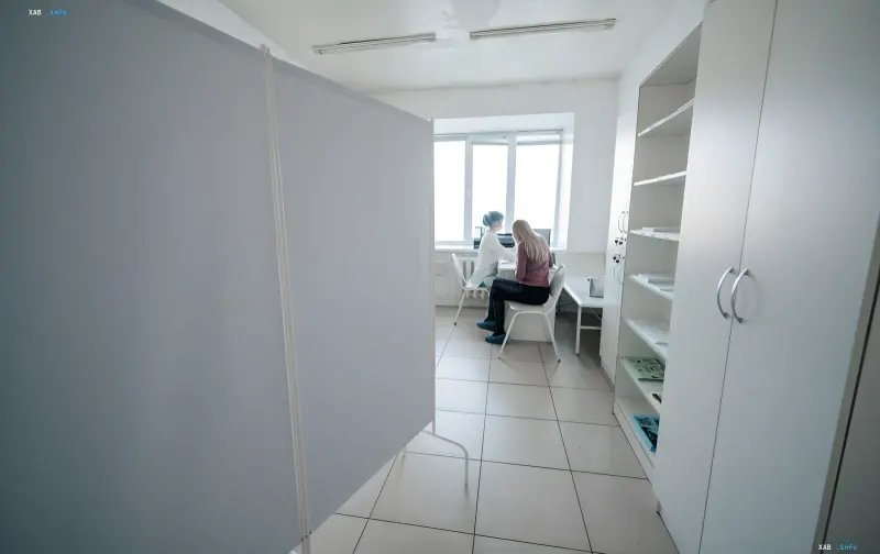 Doctor consulting a patient in a medical office when prescribing antimicrobial therapy under the new rational antibiotic use standards approved in Ukraine