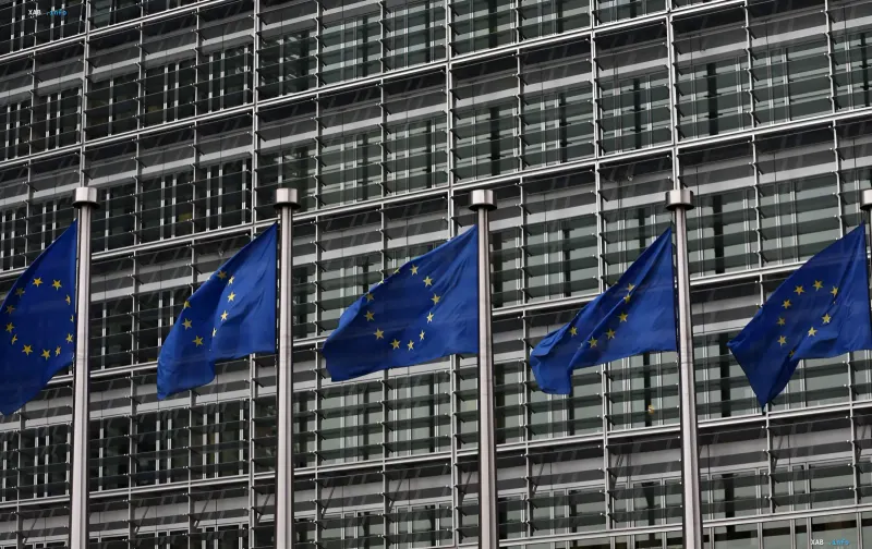 European Union flags in front of the European Commission building