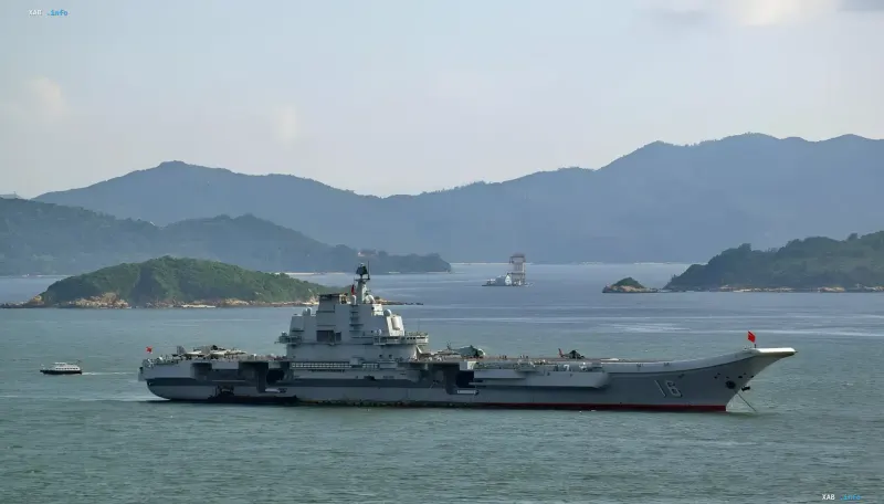 US and Chinese military warships in the ocean