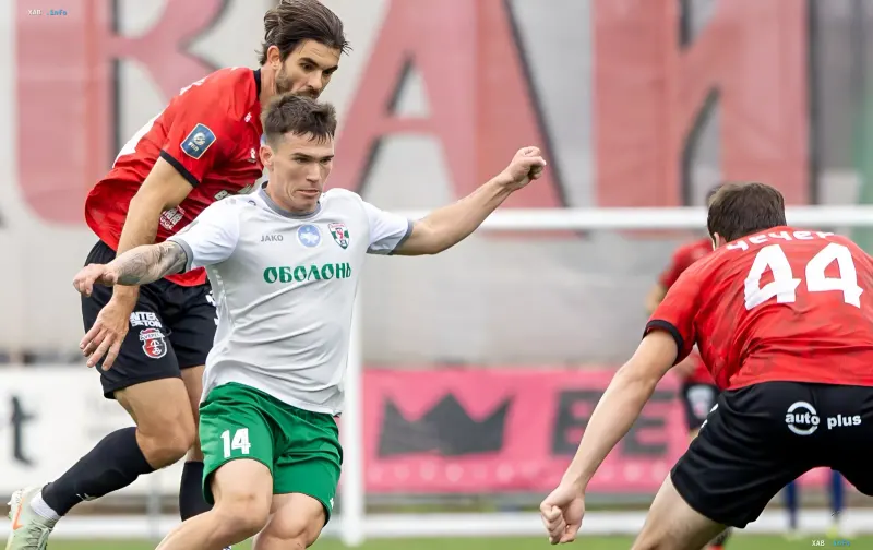 Football players battling for the ball during a Ukrainian Premier League match