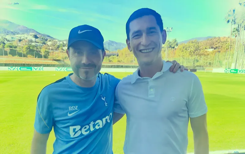 Taras Stepanenko and Roberto De Zerbi smiling together on a football pitch in Marbella