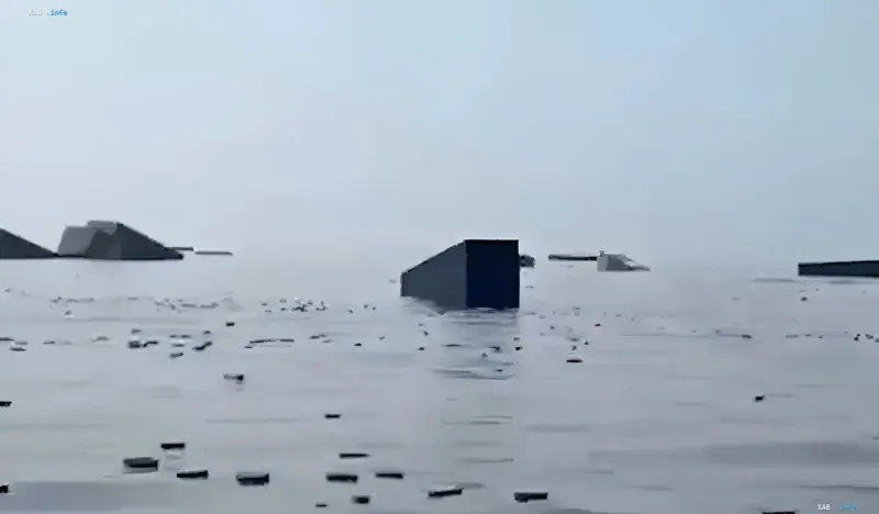 Sunken containers and parts of the GFS Pride vessel in the waters of the Strait of Hormuz