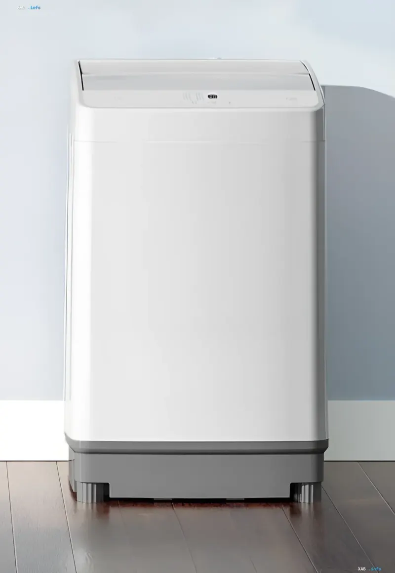 Біла компактна пральна машина Xiaomi Mijia Giant Washing Pulsator з сірою нижньою панеллю в інтер'єрі