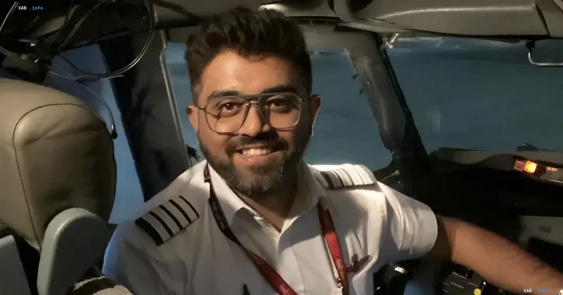 Captain Smith Machhar in the cockpit of a Flydubai aircraft smiling at the camera