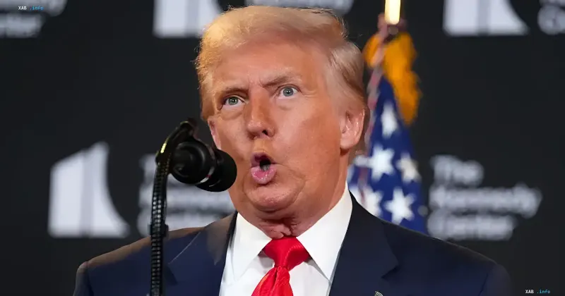 Donald Trump speaking at a microphone during a rally in Georgia