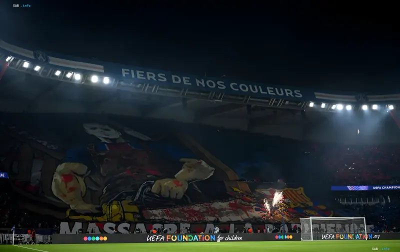 PSG fans unfurled a giant aggressive banner with a chainsaw against Barcelona in the stands of Parc des Princes stadium