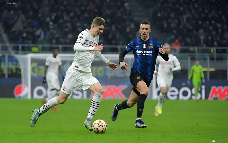Shakhtar and Inter players compete for the ball during a Champions League match