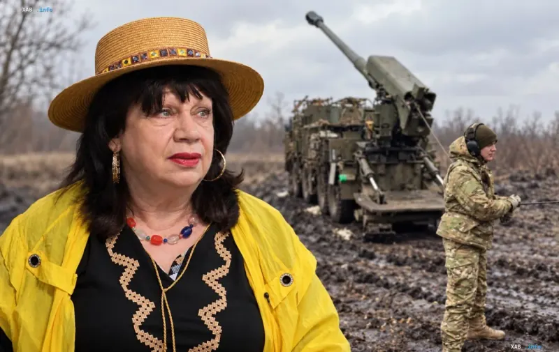 Народная артистка Украины Тамара Яценко в соломенной шляпе на фоне военной техники и военнослужащего