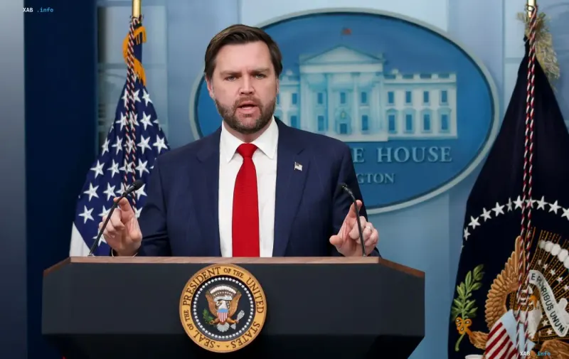 US Vice President JD Vance speaking at a podium in front of the White House seal