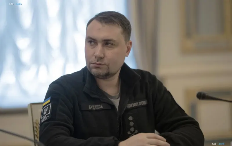 Head of the Office of the President of Ukraine Kyrylo Budanov during an official meeting in a dark tactical jacket