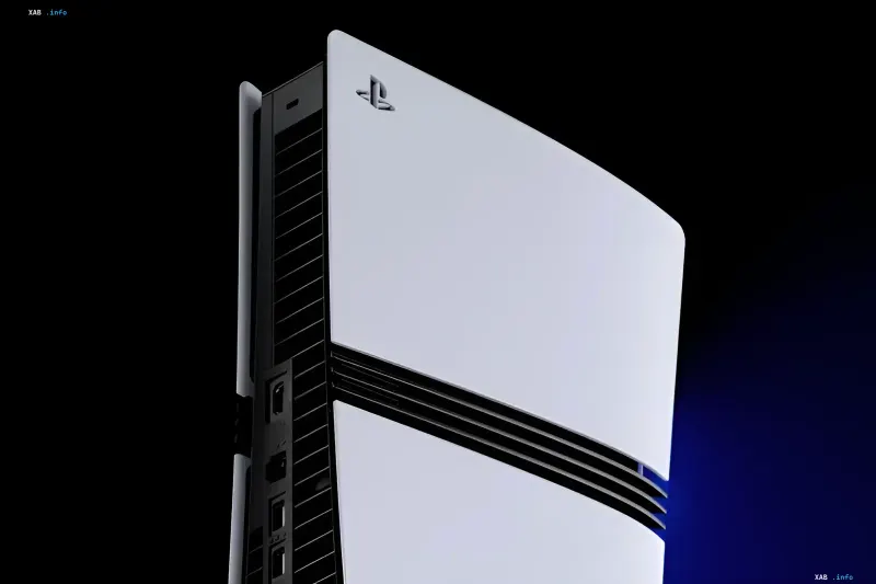 Верхня частина ігрової консолі PlayStation 5 білого кольору на темному тлі