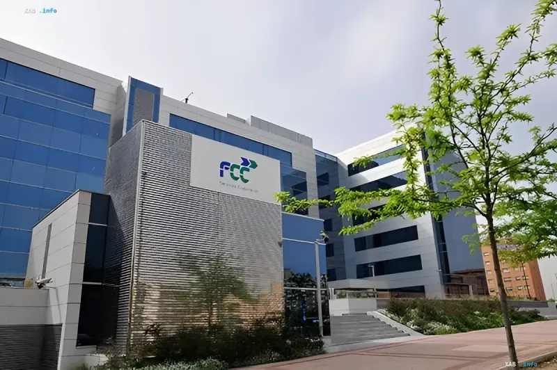 Modern office building of the US FCC headquarters against a blue sky