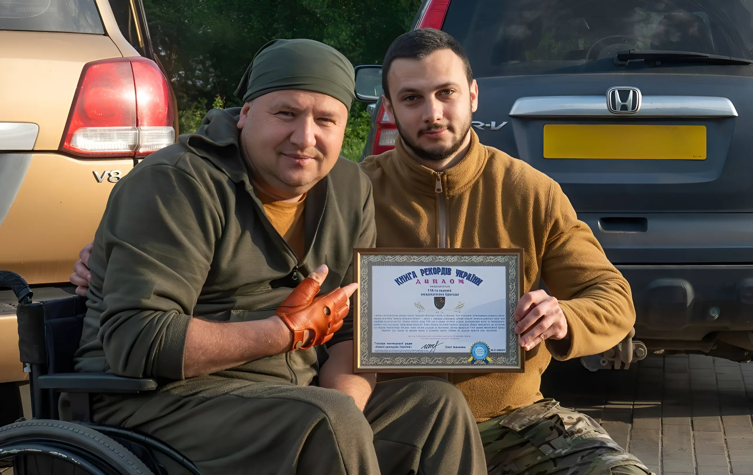 Бойцы 118-й бригады с дипломом Книги рекордов Украины за оборону Малої Токмачки
