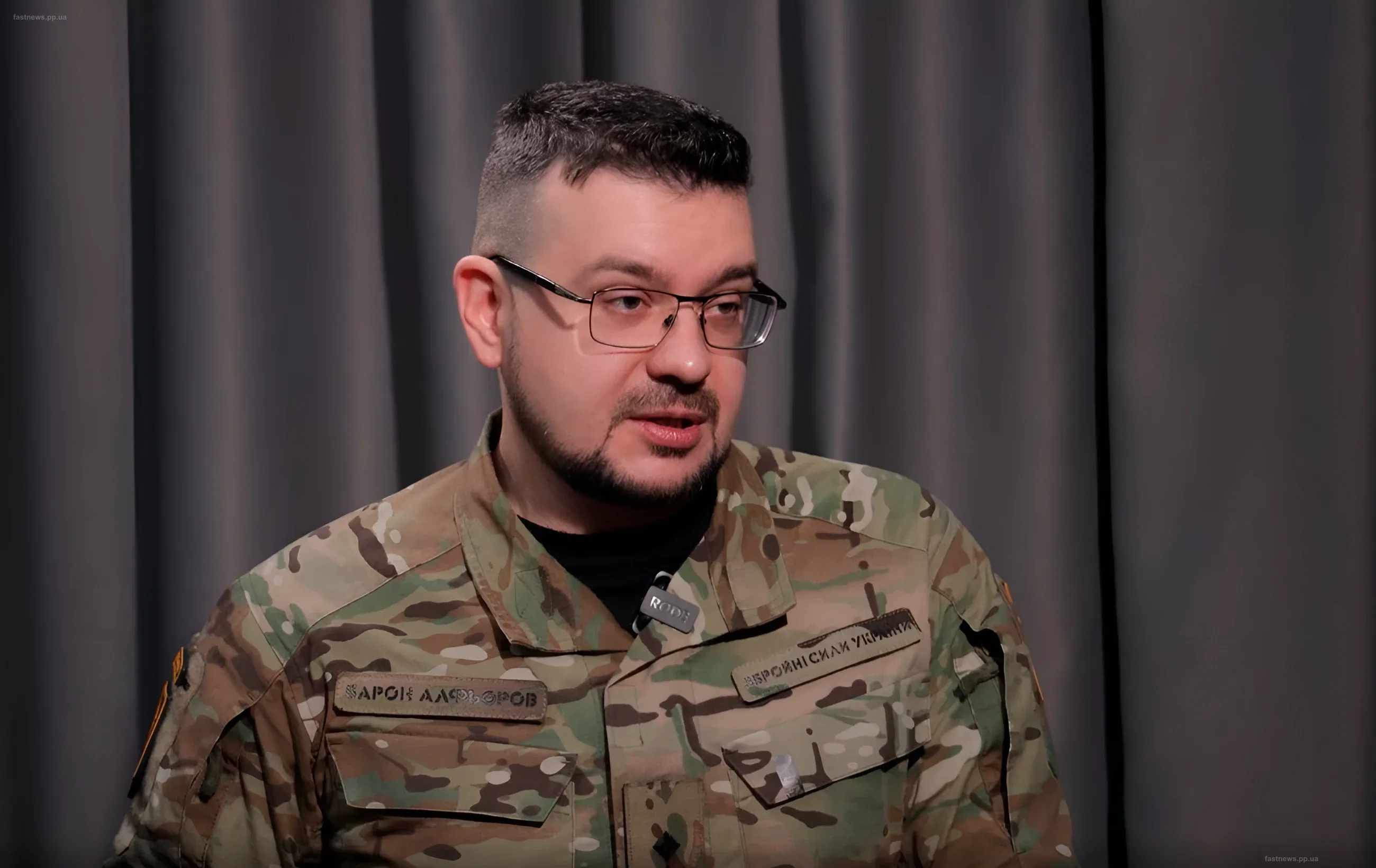 Head of the UINP Oleksandr Alfyorov in military uniform during an interview about the reburial of historical figures