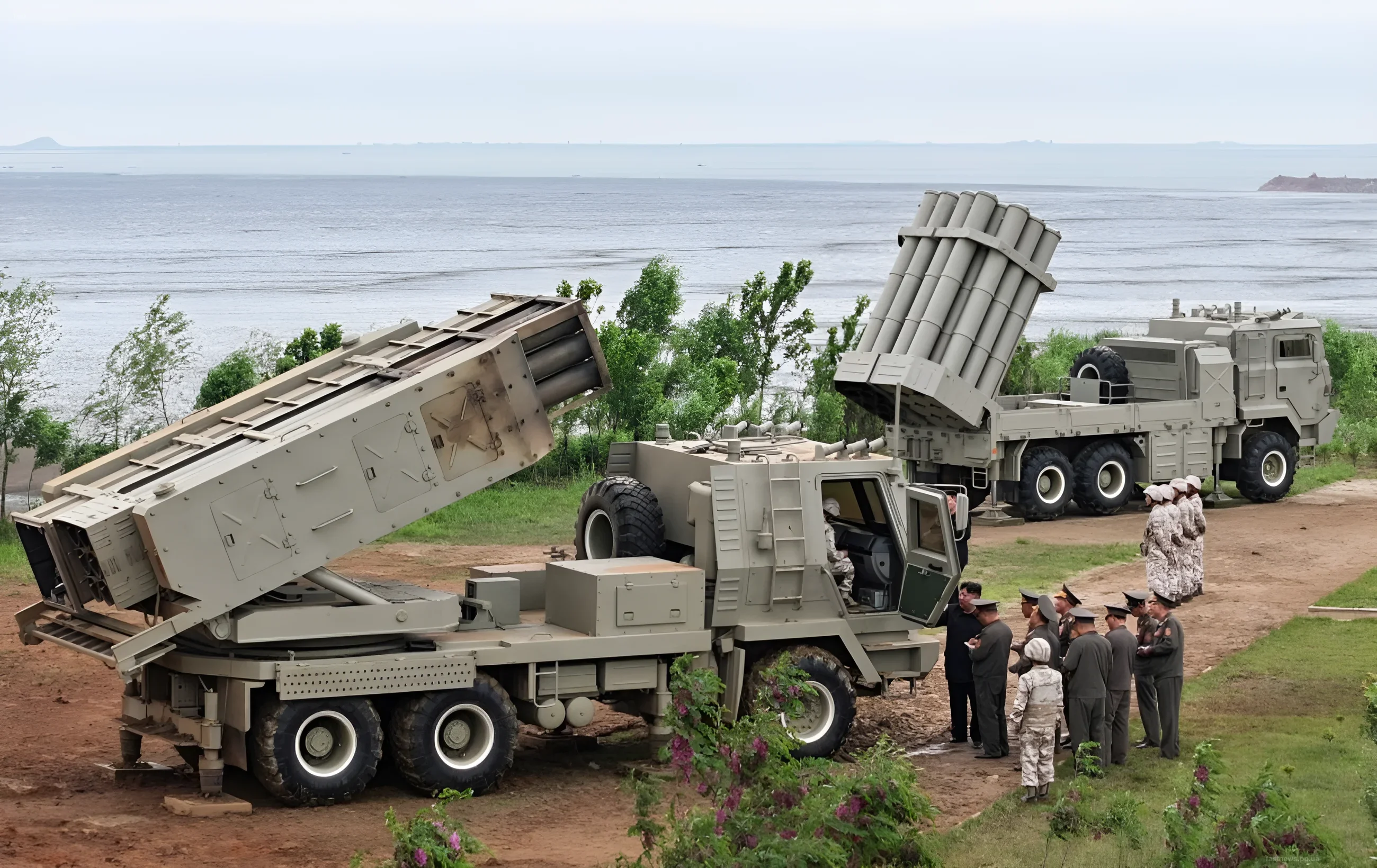 Tests of a new North Korean multiple launch rocket system against a sea backdrop
