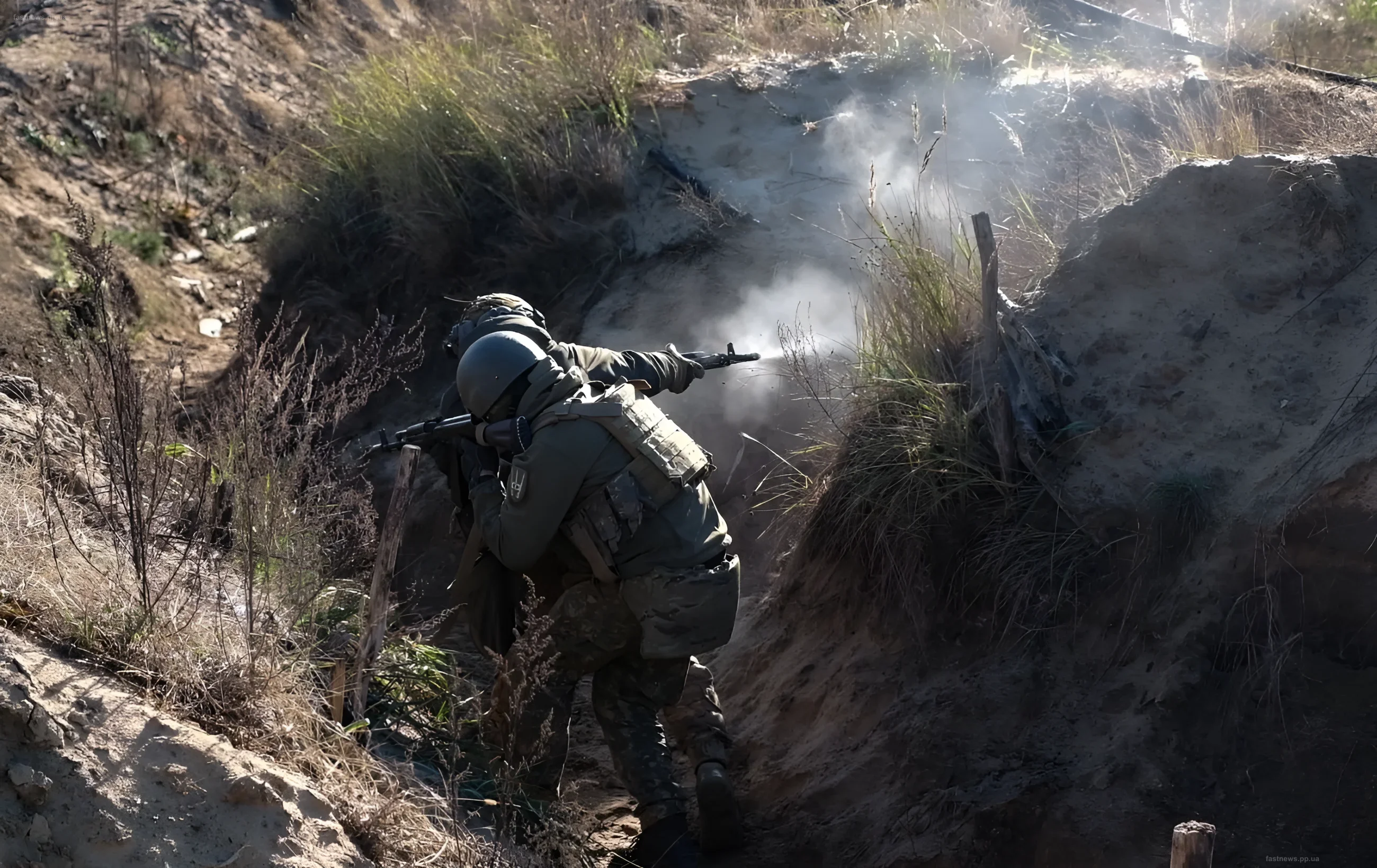 Ukrainian soldiers firing from a trench, illustrating the importance of quality defensive structures