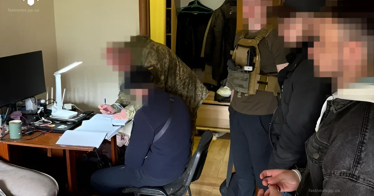 Law enforcement officers conduct a search and interrogation as part of the corruption case at the Odessa TCC