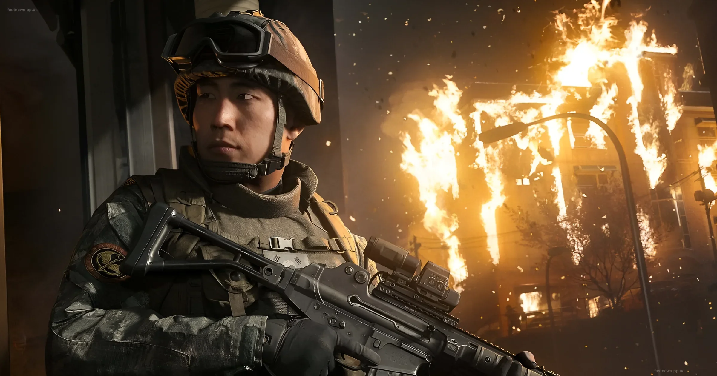 Солдат в военной форме с автоматом на фоне горящего города из игры Call of Duty: Modern Warfare 4