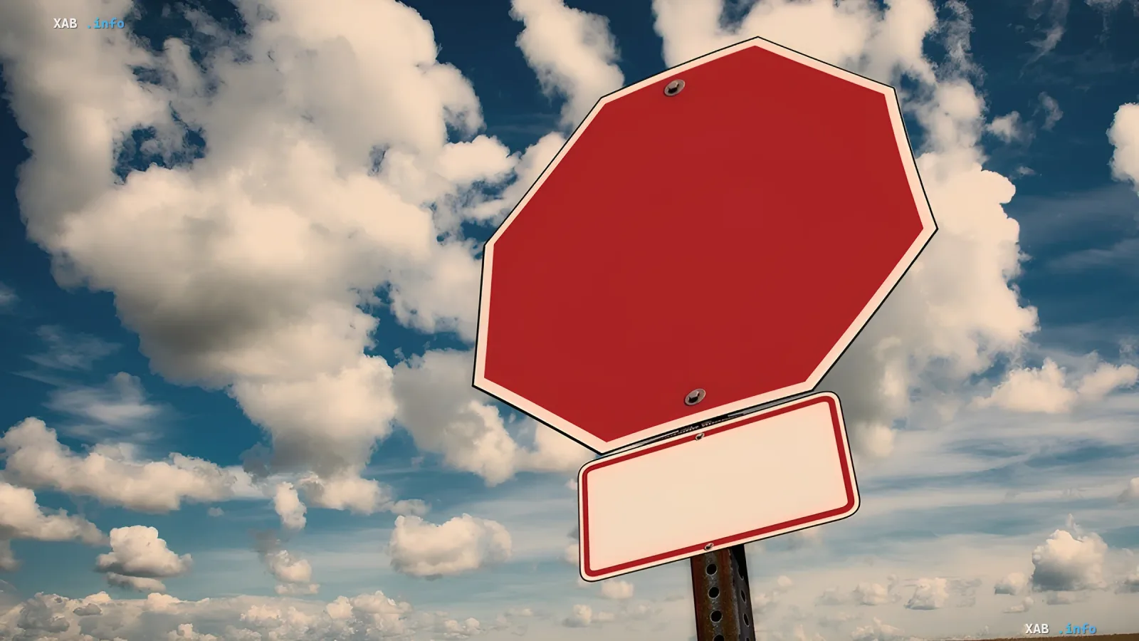 Empty red stop sign against a cloudy sky, symbolizing the ban on Russian-language culture in Poltava