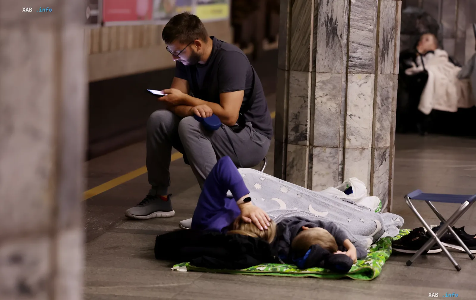 People resting in Kyiv metro during power outages following a combined strike