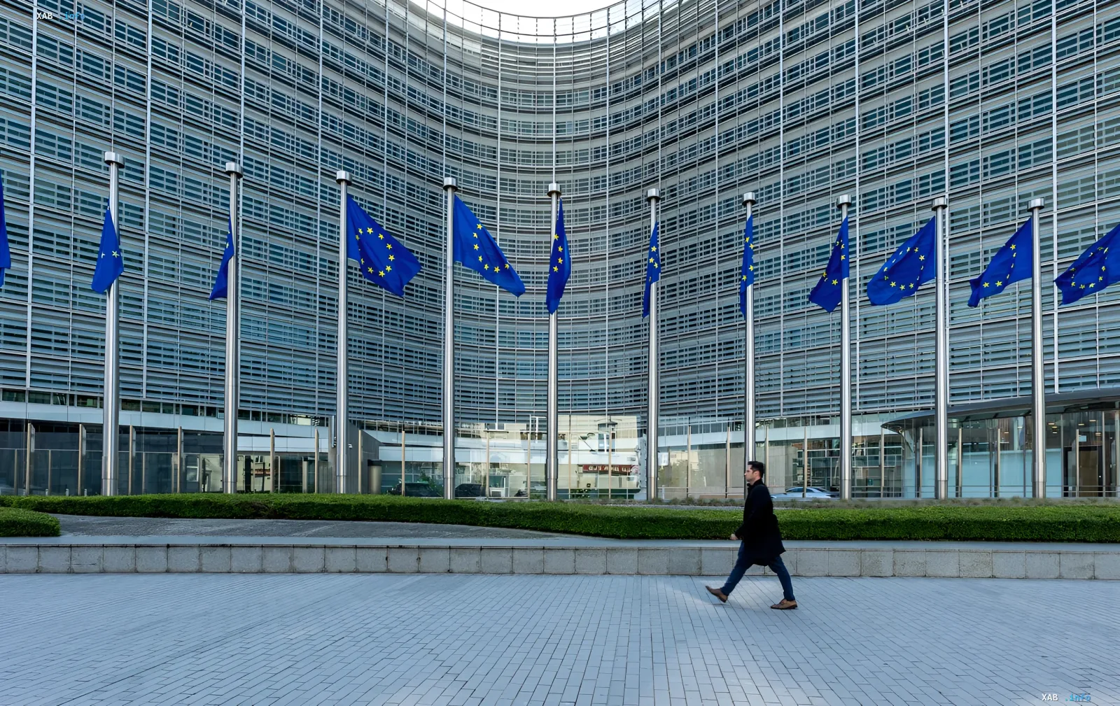 European Commission building in Brussels with EU flags in the background, symbolizing a breakthrough in Ukraine's negotiations with the EU after Hungary lifts its veto