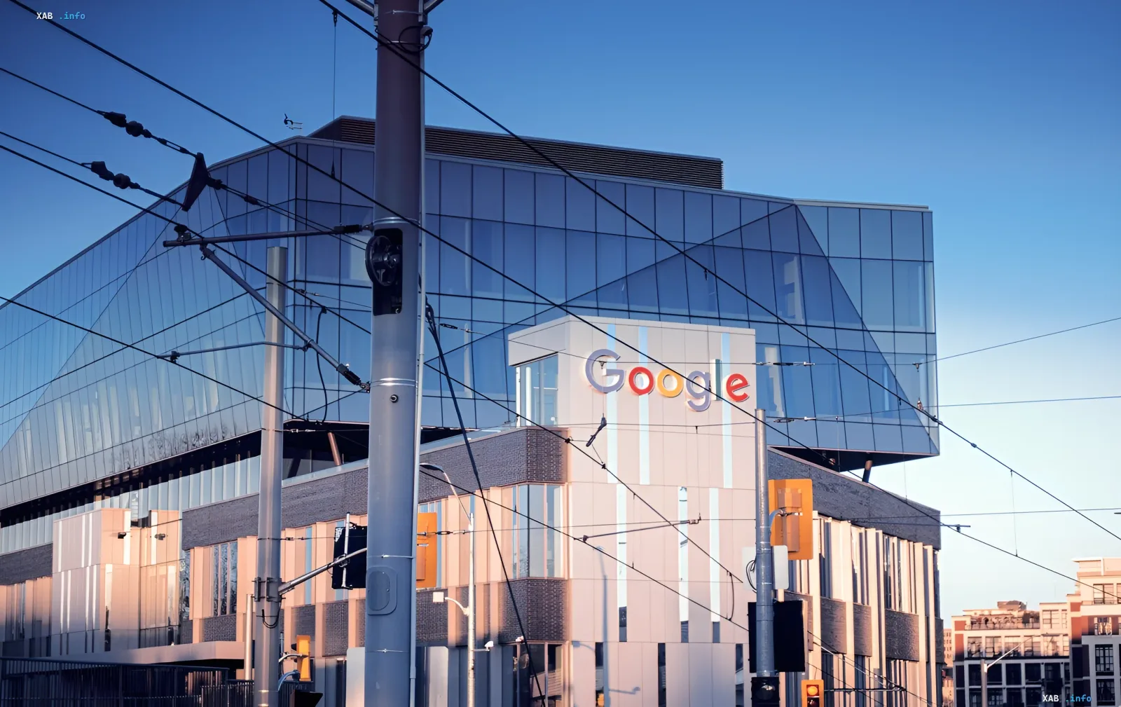 Google building with logo on facade — symbol of the tech giant renting SpaceX’s supercomputer for $920 million/month to advance AI development