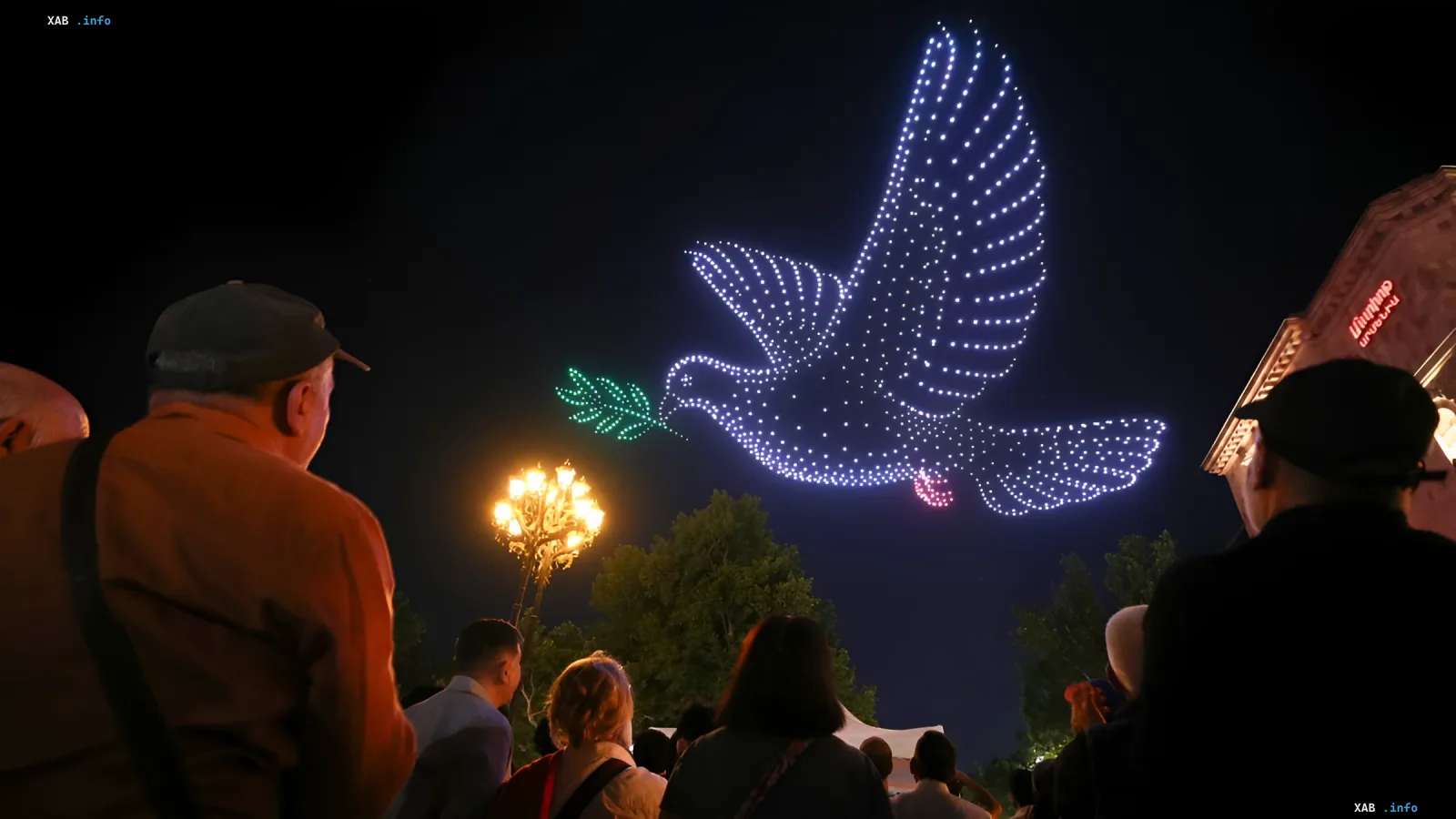 Glowing drone dove with olive branch in Yerevan sky during Pashinyan’s final campaign