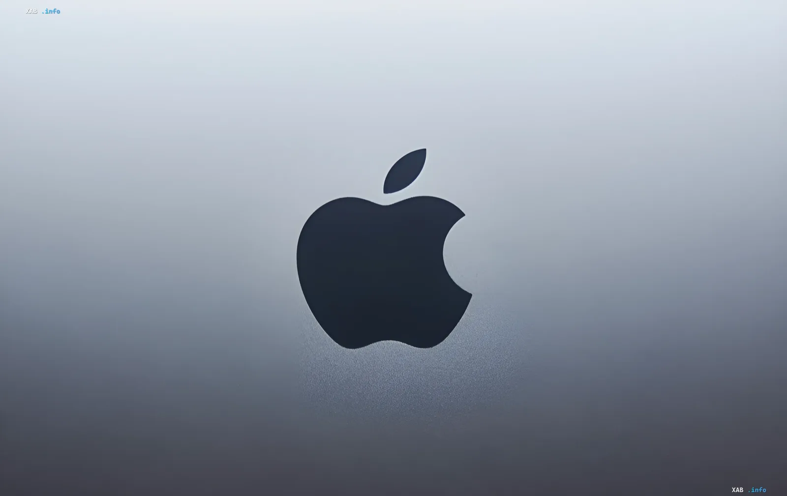 Apple logo on metallic background — symbol of Tim Cook’s era and hint at upcoming Google partnership at WWDC 2026