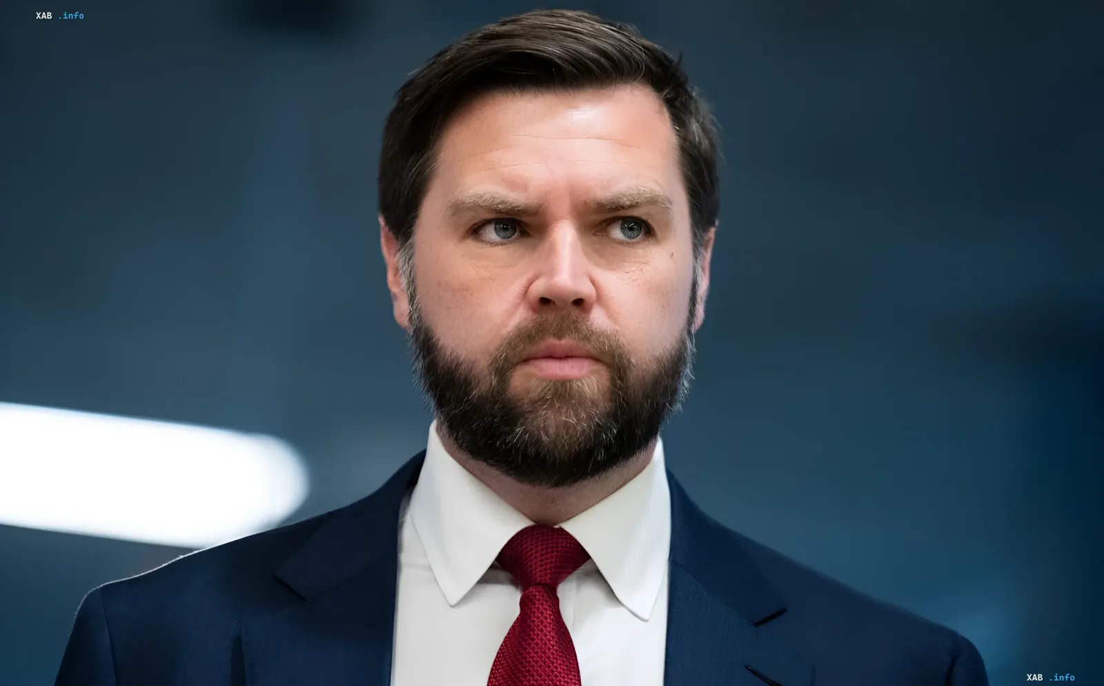 Man in a business suit with a serious expression, symbolizing the tension in relations between the US and Israel over Iran